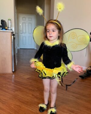 Debbie Matenopoulos Instagram - Throw back to all of Alexandra’s Halloween costumes since year one.  I have to say the Greek Yiayia is still my very favorite. Clearly it was NOT her favorite. Lol.  We even made a walker out of PVC pipe. 😂😂😂. Happy Halloween everyone. #yiayia #ghost #lamb #bumblebee #unicorn #poppytroll #princessleia