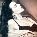 Debi Mazar Instagram - I think of my kids when I see these images! ❤️❤️ Grazie @santedorazio for posting these lovely photos of me! I think I’m the only person who didn’t strip down to nakedness for you! I ve always been a bit shy & I like some mystery… My husband @thetuscangun joked that I have a Jay Leno jawline 🤣 My hair..wow!All mine ! 💋💃🏻💯🔥