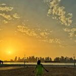 Dewi Lestari Instagram - Hari terakhir di Doha ditutup dengan sunset indah. Taburan awan mengisi langit jingga cerah. Kunjungan perdana ke Qatar, dan intuisi saya mengatakan ini tidak akan menjadi yang terakhir. I really enjoyed my stay, impressed with what I saw, and got much happiness from my experience and friendship that I gained along the way ❤️ See you again, Doha.