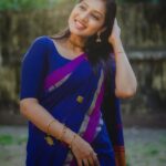 Dhanalakshmi Saminathan Instagram - மை கொஞ்சம் பொய் கொஞ்சம் கண்ணுக்குள் நீ கொண்டு வருவாய் காலத்தால் மூவாத உயர் தமிழ் சங்கத்தில்🌸🌙 Saree : @askcouturesaree Shot by : @tru_the_lens_with_monk . . . #instagood #picoftheday #sareelove #sareeseries #sareestyling #blue #ootd #sareecollection #sareecollaboration #monthend #fyp #featured #explorepage #explore #dhanasaminathan