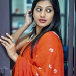 Dhanalakshmi Saminathan Instagram - ✨ Shot by : @tru_the_lens_with_monk Saree: @askcouturesaree . . . #instagood #instadaily #instapost #outfit #ootd #orange #picoftheday #postoftheday #featured #explorepage #sareestyling #sareelove #sareecollaboration #exploremore #dhanasaminathan #dhana #dhanaanu