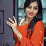 Dhanalakshmi Saminathan Instagram - When you are the main character of your life, insta algorithm doesn't matters;) Saree: @askcouturesaree Shot by : @tru_the_lens_with_monk . . . #instagood #instapost #instadaily #outfit #photooftheday #picoftheday #trending #featured #explorepage #tamil #orange #sareestyling #saree #sareeseries #dhanasaminathan #anu