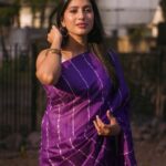 Dhanalakshmi Saminathan Instagram - 🌞🏵️ Saree: @askcouturesaree Shot by : @tru_the_lens_with_monk . . . #instagood #instapost #picoftheday #post #postoftheday #purple #sareeseries #sunsets #portrait #sareestyling #dhanasaminathan