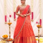 Dharshana Ashokan Instagram – Beautiful @dharshana_ashokan flaunting in orange with pink pleated Embroidered lehenga🌸🌸

Bridal Edit 2024

Ever beautiful @dharshana_ashokan 
Lens @haran_official_ 
Mua @makeup_by_kez 
Hair stylist @banuhairstylist 
Jewellery @challani_jewellery 
Decor @dj_flowers_garlands 🌸