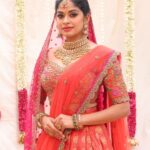 Dharshana Ashokan Instagram – Beautiful @dharshana_ashokan flaunting in orange with pink pleated Embroidered lehenga🌸🌸

Bridal Edit 2024

Ever beautiful @dharshana_ashokan 
Lens @haran_official_ 
Mua @makeup_by_kez 
Hair stylist @banuhairstylist 
Jewellery @challani_jewellery 
Decor @dj_flowers_garlands 🌸