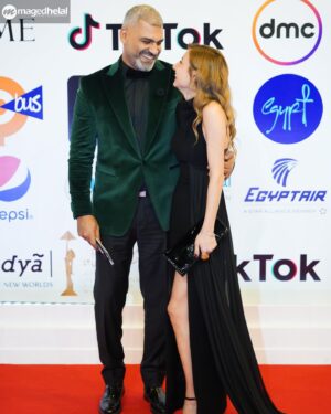 Diamand Abou Abboud Instagram - With my beautiful and handsome husband @hanyadelofficial at the opening of Cairo International Film Festival. Congratulations @cairofilms @mohefzy and all the team !!

Styled by @georgesrichane 
Dress by @basilsodaworld 
Hair by @butterflyhairstudioo 
Accessories by @kaffatma 
Huge thanks to all ♥️
And thank you @kariemfadl @asmorii !!!
📸 @maged_helal 

#cairofilmfestival #CIFF #film #festival #cinema #movies #hanyadel #diamandabouabboud #love #life #laughter #dreams #createbeauty #makecinema #cairo #Egypt