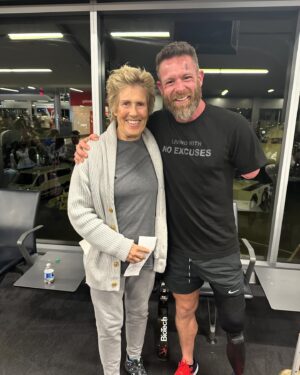 Diana Nyad Instagram - Several of you asked if people recognized me and Bonnie while we were in Italy. Actually, quite a few. The funniest was on our flight back from Rome. My book fell from my lap. I leaned down very close next to the woman in front of me, so as not to startle her, to ask her to retrieve my book. Our faces were just a couple of inches apart. She was in fact startled and whispered, incredulously, “Are you Diana NYAD?” We both had a good laugh. But there was a hero I recognized while traveling and was thrilled to meet him. Noah Galloway lost both his left arm and leg in Iraq and has turned to extreme fitness and inspiring. His mantra: “No Excuses”. 
#noahgalloway #diananyad #nyad