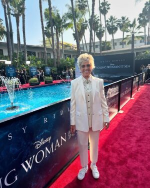 Diana Nyad Instagram - Last night saw the premiere of The Young Woman and the Sea, starring the captivating Daisy Ridley (am with her here). The 1926 heroism of the first woman to swim the English Channel had me enthralled scene by scene. Thus, only fitting that Music Friday is accompanied by Bobby Darin’s Beyond the Sea. Many swimmer Olympians attended. Am here with my old friend, 1976 gold medalist John Naber. #musicfriday
#nyad #daisyridley #disney #johnnaber