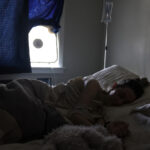 Dianna Cowern Instagram - (Dianna's editor posting) Dianna is currently suffering from a multi-week crash. It's been over a year since she got sick and she will still crash from any minor mental or physical stress. These crashes are the result from her severe MCAS and ME/CFS. I started helping Kyle and Dianna full-time here a couple months ago, and it's surreal to see her state. I think when you're not around it, it's easy for the time to pass, or to assume the time goes by relatively easy from her bedroom. But it doesn't. Dianna still doesn't consume anything that is potentially overstimulating for her mind. She doesn't watch movies, read books, or listen to music. She's able to speak more throughout the day than she used to, and she develops little funny sentences or short songs in her head. But other than that, you're looking at it. These pictures are the exact place she has been laying since January, unable to even get up and use the bathroom. This disease is slow, very slow. Some weeks are worse than others... #MECFS #chronicfatigue #longcovid #LongCovid19 #PhysicsGirl #notaflu #mecfsawarness