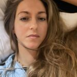 Dianna Cowern Instagram - I have 4 months worth of selfies like this because couch is all I’ve been doing. Since July, I’ve been struggling with what’s called “Long COVID.” Someone you know might’ve had this syndrome, and not even known. For me, the symptoms are, being unable to get out of bed for a few weeks after I pushed to finish my last YouTube video. (Post-Exertional Malaise). Becoming dizzy and nauseous if I walk more than 10 mins a day (Exercise Intolerance). Spelling cancel “cansul” in an email, losing my place in the sentence I was just writing, inability to process any scientific papers (Brain Fog). Getting extremely stressed while driving. (Emotional Disregulation) Along with extreme fatigue, sleeping like a teenager, breathlessness, digestive issues, chest pain, and kryptonite intolerance. Post-COVID syndrome takes a few forms, including post-ICU complications, but mine is very similar to Myalgic encephalomyelitis/chronic fatigue syndrome (ME/CFS). I’m hoping to make a video soon about this, but not yet. There won’t be a lot of videos from me for the next few months. I’m sad too. 😛
