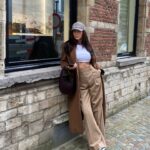 Dita Istrefi Instagram – Dump in Antwerp 

Casquette: @miumiu 
Sac: @coperni 
Manteau: @cosstores 
Pantalon: @burberry 
T-shirt: @zara
Baskets: @prada