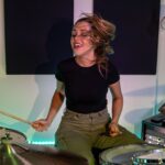 Domino Santantonio Instagram - Are you an Arctic Monkeys fan? If you aren’t, you will be after hearing Domino’s drum cover of Fluorescent Adolescent! Show her some love in the comments and recommend more songs for her to cover! #fluorescentadolescent #arcticmonkeys #britrock #britpop #ukband #drumcover #rockdrums #drumbeat #drummer #dominosantantonio #thomann #speakmusic