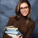 Domino Santantonio Instagram - My turn to try the AI yearbook trend 🤓📖 Which one is your favorite? 😂 #aiyearbook