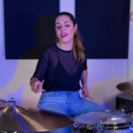 Domino Santantonio Instagram - Domino flies the Canadian flag for this interpretation of the Zamboni-powered hit “Greedy” by Tate McRae 🇨🇦 🤩 What do you think of Domino’s drumming on this? Leave a comment 💬 #dominosantantonio #tatemcrae #greedy #zamboni #iceskatingrink #hockeyrink #canadianpop #popmusic #drumming #thomann #thomannsdrumbash #drumbash #speakmusic