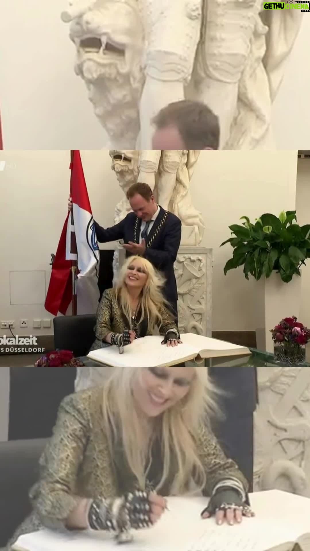 Doro Pesch Instagram - Here's some footage from German TV and from behind the scenes of the signing of the #GoldenBook of my former hometown #Düsseldorf. Thanks so much again to all the friends showing up, @sammyamara79 of @broilers & #VomRitchie of @dietotenhosen_official & @diekruppsband & the girls of @tusa_06_damen & many more! Thanks to the city of @duesseldorf & mayor @stephankeller2020 & the whole team! Thanks so much to @zibby_krebs for joining me for 'All We Are'! Golden suit for Golden Book by @stephan.goerner.frankfurt Thank you! Yummy vegan catering by @resi_lecker 🤘💪❤️🙏 #Love, #Doro - @wdr @lokalzeit Pix by Landeshauptstadt Düsseldorf, Ingo Lammert - - - - #doropesch #conqueress #allweare #warlock #allformetal #triumphandagony #broilers #dietotenhosen #dorofürimmer #metal #heavymetal #rock #metalhead #metalqueen #queenofmetal #fürimmer #oi #rocknroll #diekrupps #blondeshavemorefun #vegan #soberlife #nuclearblastrecords @nuclearblastrecords #monstersofrock #monstersofrockradio