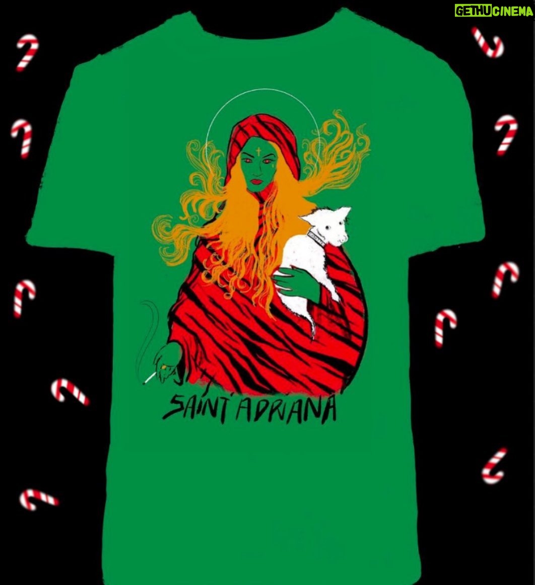 Drea de Matteo Instagram - My baby girl Alabama @d.j.gypsy and @uvways Robby made these festive shirts! Celebrate Christmas or whatever the fuck you want with this hand screened soft blend tee honoring Saint Adriana La Cerva. Sheβs back from the dead with a loving vengeance. Cigarettes and dead dogs sold separately. Made to order and shipped globally. Check out @foodbank4nyc! We are donating a portion of the proceeds to help feed New Yorkers in need β₯οΈππ½ LINK IN @uvways BIO for shirts!!! LINK IN MY BIO TO DONATE TO #teamqueens #fiveboroughchallenge Tiz the muthafuquin season! ππππ