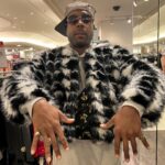 Dulcé Sloan Instagram – It’s #nationalsiblingday ! Check out my brother @lawrencesloan in this gorgeous coat and my rings as pinkie rings!