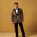 Eka Lakhani Instagram - Here’s to continued triumphs and conquering even greater heights! Always an inspiration! ❤️ @karanjohar for @goldhouseco’s Gold Gala in LA. Wearing @rimpleandharpreet Eyewear @gucci Ring @jaipur_jewels @dipublicrelations Footwear @coppermallet #StyledByEka Style team @arpita.kc @mayuri_srivastava @shaikhmehboob763 @team___e Hair and Make up by @mr.sarah__ Managed by @len5bm #KaranJohar #GoldGala #GoldBlazer #TeamE [Karan Johar, Gold Gala LA, Eka Lakhani]
