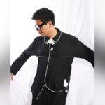 Eka Lakhani Instagram – Monochrome mornings ft. @karanjohar 

Wearing @maisonvalentino
Eyewear @gucci @marceloburlon
Ring @rickowensonline @inoxjeweleryin
Footwear @prada

#StyledByEka
Style team @anolishahudani @arpita.kc @mayuri_srivastava @team___e 
Hair @rajeev_gogoi
Makeup @paresh_kalgutkar 
Managed by @len5bm 
Photographed by @sheldon.santos 

#KaranJohar #MonochromeStyle #PJLovers #Valentino 
[ Karan Johar, Monochrome PJ, Eka Lakhani ]