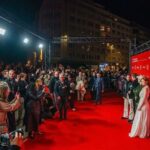 Eleanor Tomlinson Instagram - What a night celebrating The Couple Next Door with my favourite people ♥️ Thank you @filmfestivaloostende for having us and honouring @samheughan and I with a star on your promenade! As always, thank you to our wonderful crew who made TCND one of the best experiences yet, and last but definitely not least, thank you to you gorgeous fans for showing us such love ♥️ • Styled by @rebeccacorbinmurray in @giambattistavalliparis @jimmychoo @vaara_studio @vraiofficial & @shoptheirishtwin @filippa_k @louboutinworld @ananyafinejewellery • Hair and Makeup by @michelle_beeckman_makeup