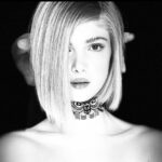 Elena Kampouris Instagram - 😇or😈? @netflixgeeked @netflix @mrmarkmillar #JupitersLegacy #behindthescenes #Chloe #style #vogue #photography #hairstyle #earrings #Photoshoot #Day #night #Angel #new #Hair #Cars #ootd #runway #art #model #blonde #black #brunette #blackandwhite #fashiondaily #bts #instafashion #instastyle #instapic #instadaily #instafun