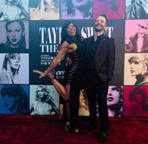 Eliotte Woodford Instagram - Wow. What a NIGHT. What a MOVIE. What a TEAM OF STARS I somehow get to surround myself with while supporting the BRIGHTEST STAR, @taylorswift .

I am still in awe of what I witnessed in that theater. I was immediately immersed in the world of #TheErasTour and felt like I was truly at a stadium show. It was so amazing to actually feel like I was in the audience of this wonderful spectacle. I was scream shouting, singing, dancing, and having THE MOST FUN. 

I can’t wait for everyone to experience this concert as an EPIC FILM. Whether it’s your first or fifth time seeing the show, I hope you have as much fun as I did. 

To say I’m honored and blessed to be a part of THIS SHOW with THESE PEOPLE is the biggest UNDERSTATEMENT. 

THANK YOU to my Eras Tour cast and crew family and @taylorswift for making me BETTER. I love you all!

WE MADE A MOVIE!!!!
🤩🥳🥹

Makeup: @mayelypaez 
Styling: @styledbyhannahmellow 
Dress: @herveleger 
Shoes: @dolcegabbana 

Ps- it’s dumb I can’t tag my whole fam here!
I love yall forever. 

#taylorswift #TS #tstheerastour #tstheerastourfilm #movie #moviepremiere #redcarpet