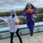 Eliza Butterworth Instagram – Happy Halloweeeen!!! 🧡🎃🧡 this is from our lil Halloween party last year for the little ones! For their amusement, Michael and I went as Minions! #halloweenhoneys #pumpkinpeeps #spookysausages #magnificentminions