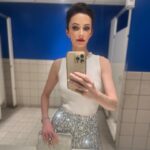 Elizabeth Tulloch Instagram – On a separate note, a) I could not resist this gorgeous Yves Klein-y blue bathroom. As I’m about to enter our final season of #SupermanandLois, in the 85th year of this incredible, powerful character existing, I wanted to pay homage to what I imagined an OG Lois from 1938 might have worn to accept an award. ❤️

Thank you to everyone involved in my look:
�Skin/Facialist: @carasoin 
Top, skirt: @aliceandolivia @staceybendet
Makeup: @andresarmiento 
Hair: @hellohairbear 
Heels: @jimmychoo
Jewelry: @gabrieleandco @michelemariepr