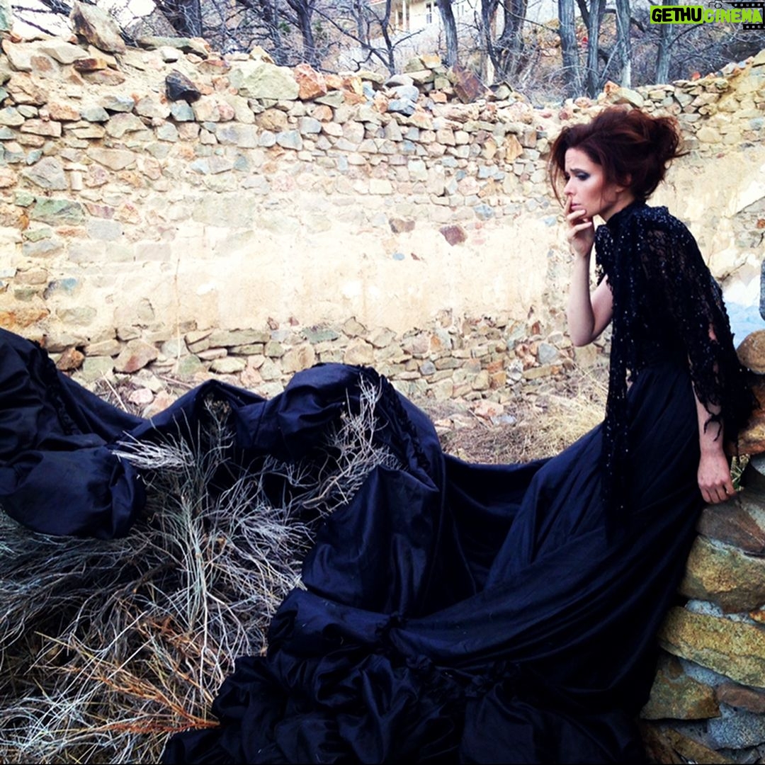 Elizabeth Tulloch Instagram - Throwback to this photo shoot with amazing photographer @franzszony. If you’re not familiar with his work, check it out! This was such a gratifying shoot, wandering around the streets of dusty Nevada, telling a different story with each photo. Gowns by @michael5inco 🖤