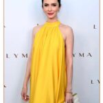 Elizabeth Tulloch Instagram - Had a lovely time with my girl @azietesfai celebrating the launch of @lymalife’s new skincare line. Thank you @aliceandolivia for this beautiful dress and shoutout to @bradgoreski and @storyofmailife for being the best dinner party dates. 💛💛💛
