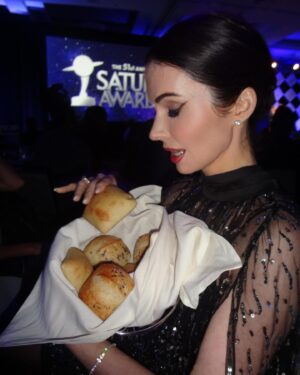Elizabeth Tulloch Instagram - Some #behindthescenes from @saturnawards Sunday night. 
Dress: @aliceandolivia by @staceybendet 
Heels: @toryburch 
Makeup: @andremakeup 
Hair: @hellohairbear 
Skin: @theskingirls @vancouvermedicalaesthetician 
Bestie: @realbreeturner
It was such a wild night of weather!!! But incredible awards show, thank you @saturnawards!! Christopher Nolan, Keanu Reeves, Jodie Foster, James Cameron, Kevin Feige, Emily Blunt etc etc - I was fangirling everywhere. I LOVE being a part of a genre show (again - love you #Grimm fans!). Best and most loyal and smartest fans ever. Thank you so much for coming out in a major storm and I apologize to everyone who I didn’t get to in the autograph line - bc of the weather I was late to the awards and was being rushed inside. 

💓💓🥰