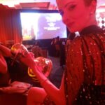 Elizabeth Tulloch Instagram - Some #behindthescenes from @saturnawards Sunday night. Dress: @aliceandolivia by @staceybendet Heels: @toryburch Makeup: @andremakeup Hair: @hellohairbear Skin: @theskingirls @vancouvermedicalaesthetician Bestie: @realbreeturner It was such a wild night of weather!!! But incredible awards show, thank you @saturnawards!! Christopher Nolan, Keanu Reeves, Jodie Foster, James Cameron, Kevin Feige, Emily Blunt etc etc - I was fangirling everywhere. I LOVE being a part of a genre show (again - love you #Grimm fans!). Best and most loyal and smartest fans ever. Thank you so much for coming out in a major storm and I apologize to everyone who I didn’t get to in the autograph line - bc of the weather I was late to the awards and was being rushed inside. 💓💓🥰