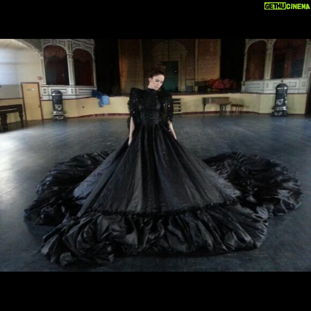 Elizabeth Tulloch Instagram - Throwback to this photo shoot with amazing photographer @franzszony. If you’re not familiar with his work, check it out! This was such a gratifying shoot, wandering around the streets of dusty Nevada, telling a different story with each photo. Gowns by @michael5inco 🖤