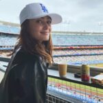 Ella Purnell Instagram – peanuts and cracker jack!!!! Thank you @healthade @dodgers for making this Brit’s first baseball game so fun :)✨