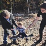 Elle Fowler Instagram - 3 generations of men - Baby James, Alex, and Papa Goot hanging on a swing at Lake Champlain 💗