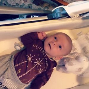 Elle Fowler Instagram - My little wizard 😍 Such a tiny tot, swimming in his 0-3 month outfits at 2 months old lol. Pretty sure his pants are on backwards, his daddy dressed him lol. 🤷🏼‍♀️