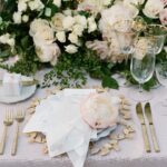 Elle Fowler Instagram - Table setting details... I loved the gorgeous Grecian details and the gold silverware! @brides #brideslivewedding
