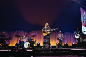 Ellie Holcomb Instagram - y’all!!! It has been an absolute JOY to be opening for @laurendaigle on her Kaleidoscope Tour. Lauren is a kindred spirit and dear friend, so to get to go on the road together feels like a dream. I’ve loved singing with people all over the place, and hearing y’all sing along. I’ve LOVED watching Lauren and her incredible band put on an amazing show in each city, each one special and unique. We are having a blast with her band and crew and my band and crew is incredble too! 

This week, i’ve had my daughter out on the road with me. She loves Lauren and her music, so we’ve been singing along each night together.  She is also out on the road to help watch her godbrother, Triumph. His momma, of @thenewrespects, is out playing guitar for me on these shows, and it has been the sweetest thing to watch her love and help take care of him. It feels like family out here on the road, and I’m so grateful.  Thanks to Lauren and her crew for making us feel so welcome, and thanks to my crew for working so hard to make it possible to play these shows and connect with so many people each night. @s.grantparker @zandymowry @jschrodt @jacthompsonmusic @morganrcombs @sethtalley @jaymindesai @shamilt0n Y’all are some of my favorite people to be with, and I feel lucky to work with so many people that I respect and love so deeply. 

If you’re new here to my page, welcome. It’s one big happy family here on this page. Welcome to the family!
