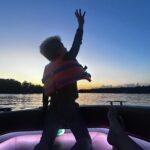 Ellie Holcomb Instagram - Summer is here , full send!! I caught lightening bugs in the back yard in a mason jar with my youngest last night. We spent the first warm weekend at the lake with our family, surfing , playing cards, watching movies , & rope swinging. I also took a quick day trip back to Nashville for the @klovefanawards at the @opry house ! Got to perform with my sweet friend @lauren_daigle and present an award as well as take an epic golf cart ride by all the amazing fans to get to the red carpet. High fives for DAYS!! What a special night ! Tune in May 31st to check out all the goodness ! I drove right back to the lake the same night , fueled by a quick late night pit stop at Taco Bell 😜 It was all such a gift ! We took some time to remember and give thanks for all those who have sacrificed so much for freedom on Memorial Day. Lord bless each person and family who sacrifices so much . Lord, may we use freedom well. Watch the full reel to catch @drewholcombmusic surfing with our youngest and his brother surfing with his sweet 2 yr old ! Love you big @nancygrancy @hamptonaholcomb @trazodesign @nerichardson1 @sam_holcomb @kristiesholcomb @olti_miami @julieharrismiamirealtor , & @rowan__richardson ! Missed you big time @essie__richardson & Field! Before we left for the lake , we also got to hang with my whole family for dinner with my sister @carlybannister in town. SO much fun I forgot to take a pic! I hope you had a restful weekend with people you love too. Thx to my amazing team who helped get me ready for @klovefanawards too! @elliotttaylorstyling for perfect outfits head to toe , @bheadabe for incredibly fun hair and make up, and @samantha797 , my beautiful manager who encourages , wrangles , and cares for us all ! .