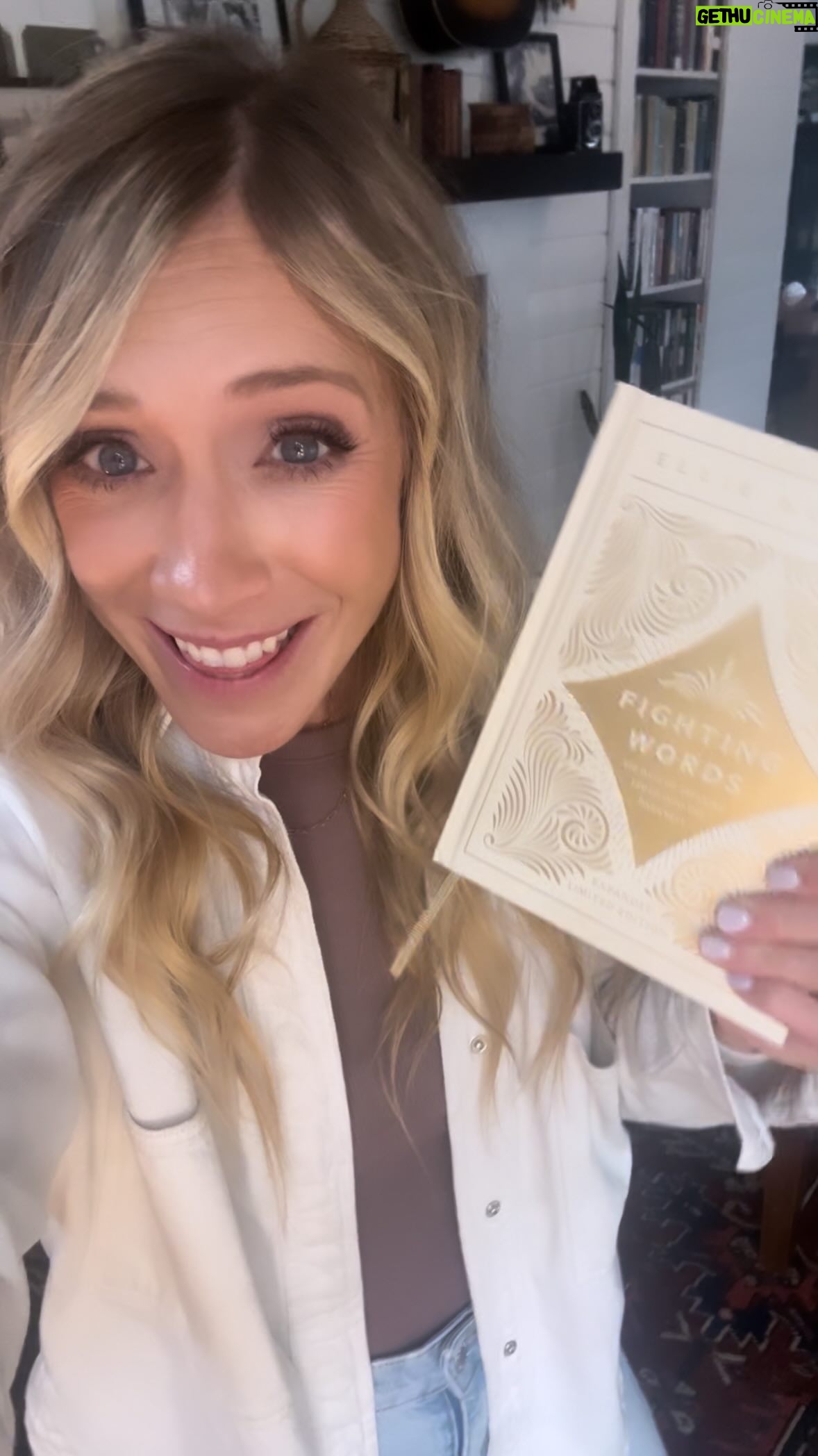 Ellie Holcomb Instagram - 🤎 NEW BOOK OUT NOW 🤎 This whole Fighting Words project started with one conversation…one conversation with one friend who was walking through the shadows of severe depression. So we started memorizing scripture together and called the verses our “Fighting Words”. Over the years, Fighting Words has grown from a conversation, to a series on Instagram, to a published devotional. And today, it is now a devotional in its expanded form! “Fighting Words: 100 Days of Speaking Truth into the Darkness, Expanded Limited Edition” is AVAILABLE NOW!!! This new addition carries ten extra devotionals and one more beautifully printed scripture memory invitation. I realized there were some “lifer” verses, as one of my grandmother’s calls them, that I didn’t include in the first edition. “Lifer” verses are the ones that have held me steady through the storms and shadows over the years. These verses also helped inspire the making of my new Psalms album, “All of My Days”, and each new devotional that’s grounded in the Psalms has its own song to go with it!!! I’m thrilled to continue the journey of memorizing scripture and burying the truth of God’s word into our hearts together, and I hope this new edition of “Fighting Words” can be the reminder you need to keep holding onto the truth and the light of God”s word, whatever storms may come. 🤎 Also, it’s just SO pretty, and looks lovely stacked next to her little sister book, the original navy edition of “Fighting Words”. Decorate your tables with pretty books and your heart with lovely truths.✨ Happy release day to “Fighting Words: Expanded Limited Edition” !! Can’t wait for you to read (and SING) along with me.