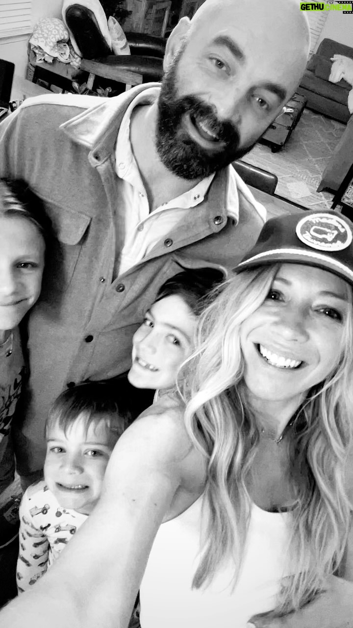 Ellie Holcomb Instagram - Sweet @drewholcombmusic surprised us all, and flew home in his one day off this week on tour ! We were all delighted ! And then , bless his heart, he came down with some kind of stomach bug . Holding him and the rest of his tour up to the light, prayin’ they’ll stay healthy to do the good work they are all doing , and speaking of light , GO see @drewholcombmusic and his band SHINE . They put on an unbelievable show you won’t want to miss ! Love you babes , and love the moment at the end of this where our youngest is trying to get away from his big sister’s wet hands that she had just washed and didn’t have time to dry before we took this picture 🤣 #reallife . Drew, I love doing real life with you, all the ups and downs . Thx for coming home to see us and thankful you’re already on the mend !