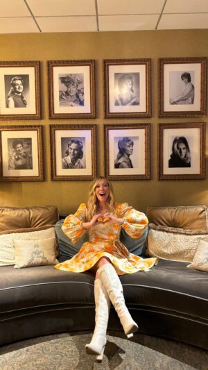 Ellie Holcomb Instagram - I really couldn’t think of a more perfect way to end a pretty incredible release day for “All of My Days”. I got to sing some of these new songs on the @opry stage while my face was on a billboard in New York City in Times Square. I love the idea that God‘s light and love and truth is going out so many places because these are just his promises to melody. Continuing to pray that all of my days is like a green pasture and quiet water for your soul on all the days of your life. 

So fun to play in between @whisperinbillanderson and @vincegillofficial as well, and I even got to see Vince sing with his daughters @corinnamusic and @realjennygill who came to sing with him for his birthday ! It is so sweet to see families a little further down the road making music together! Thanks again to the @opry for having me and to all of you for letting me sing alongside you!