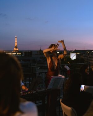 Élodie Frégé Instagram - Had the honor to witness and photograph the incredible @elodiefrege on bastille day on the rooftop of the @kimptonsthonore in Paris🇫🇷🧡
.
.
.
.
.
#photocinematica #14juillet🇫🇷 #14thjuly #nostalgiabeyond #parisjetaime #quatorzejuillet #bastilleday #forevermagazine #somewheremagazine #streetsineurope #cinematography #midnightmagazine #paris #kodakmoment #fireworks #dreamermagazine #14juillet #nightwalkermagazine #kalermagazine #burnmagazine #parismood #pariscity #parisstreet #parismylove #myparisdiaries #eiffeltower #toureiffel #eiffelturm #elodiefrege