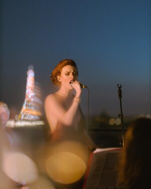 Élodie Frégé Instagram - Had the honor to witness and photograph the incredible @elodiefrege on bastille day on the rooftop of the @kimptonsthonore in Paris🇫🇷🧡
.
.
.
.
.
#photocinematica #14juillet🇫🇷 #14thjuly #nostalgiabeyond #parisjetaime #quatorzejuillet #bastilleday #forevermagazine #somewheremagazine #streetsineurope #cinematography #midnightmagazine #paris #kodakmoment #fireworks #dreamermagazine #14juillet #nightwalkermagazine #kalermagazine #burnmagazine #parismood #pariscity #parisstreet #parismylove #myparisdiaries #eiffeltower #toureiffel #eiffelturm #elodiefrege