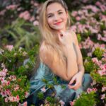 Emerald Gordon Wulf Instagram - Happy Easter! 🐣🐰🍬🌷 Dress from @joyfolie Photos by @kalialexsis What is your favorite kind of candy? If it is not listed, let me know in the comments! #easter #spring #flowers #prom #promdress #model #dance #seventeen
