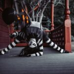 Emerald Gordon Wulf Instagram - I couldn’t stop laughing with this nose 🤥 Should I post the video of me trying to scare some tourists but failing miserably when my wig fell off? Photos by @kalialexsis #fail #Contortion #contortionist #flexible #flexibility #scary #horrormovies #horror #creepy #creepypasta #laughingjack #it #clown