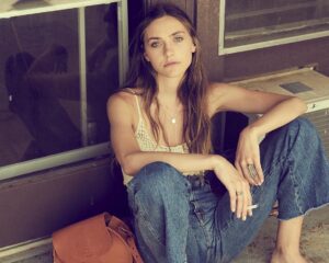 Emily Hall Instagram - This got taken down SO here’s me attempting to live out my Penny Lane dream 2.0 ✌🏻*cig is still a prop :)*