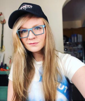 Emily Tarver Instagram - THESE ARE MY NEW GLASSES. Don’t I look like I am straight out of the hit film Cool World circa 1992 starring Brad Pitt?!? There are MANY cool stylez from @rogereyedesign and I’m probably going to buy approximately all the pairs. You can get some too and then we’ll be twanz y’all!!!