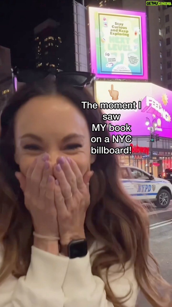 Emily Calandrelli Instagram - When I heard this happened I booked a flight to NYC to see it in person. Landed at 10pm and headed over at midnight! I couldn’t wait!!!! You guys!!! My #1 NYTimes Best Selling Book was selected by @amazonbooks to be featured on their billboard right outside Penn Station 😭😭 Such a dream. What an unbelievable dream. 🥹 #thatReadingFeelingAwaits