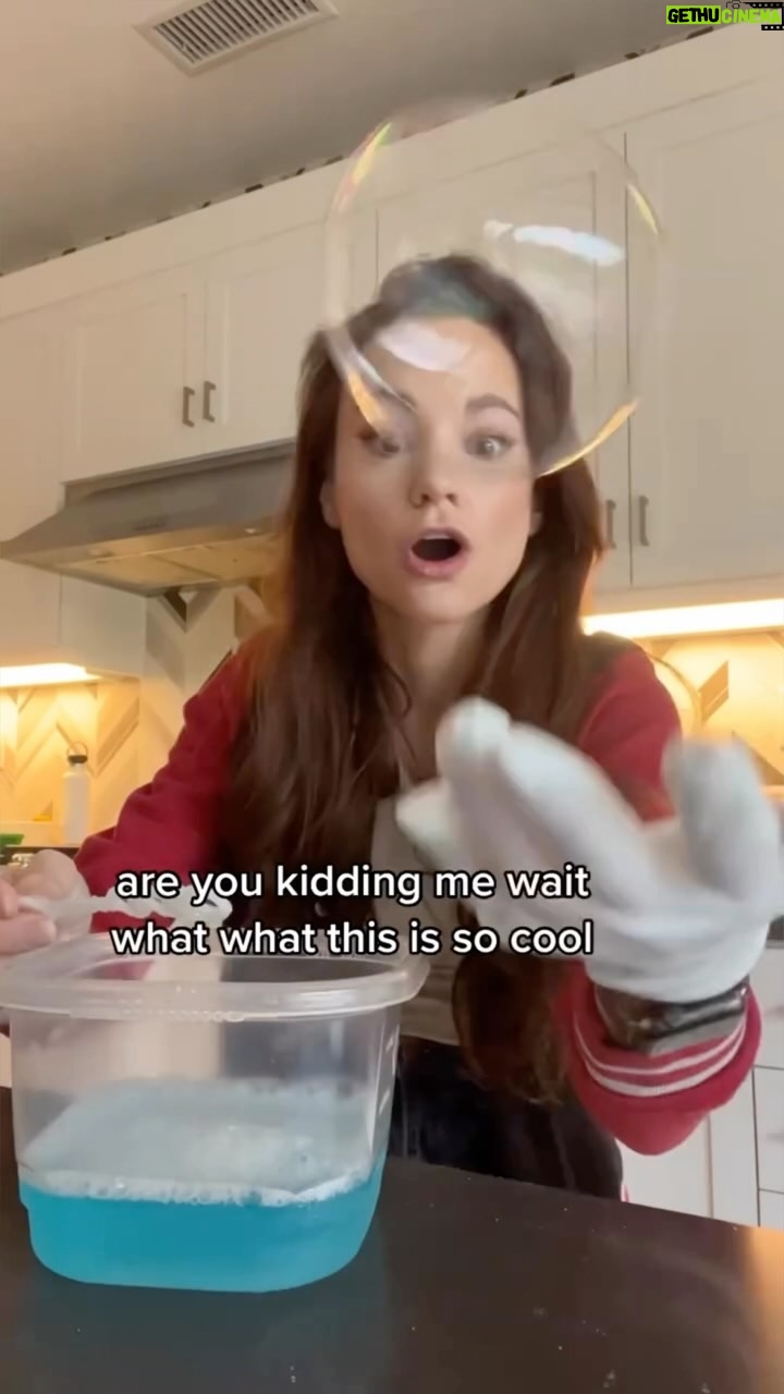 Emily Calandrelli Instagram - RECIPE BELOW🫧 Comment SCIENCE CLUB for more 😉 I created this book to help spark science joy in your kiddos and found my own little science joy along the way 🥹 Comment SCIENCE CLUB for my book that has this experiment 🫧🫶🏻 This is one our my favorites from my new book Stay Curious and Keep Exploring NEXT LEVEL! By commenting “SCIENCE CLUB” I’ll send you links to pre-order this book which includes this experiment and 49 more just like it! 1 cup cold distilled water 2 tbs dish soap 2 tbs vegetable glycerine cotton glove, you’re welcome ;)